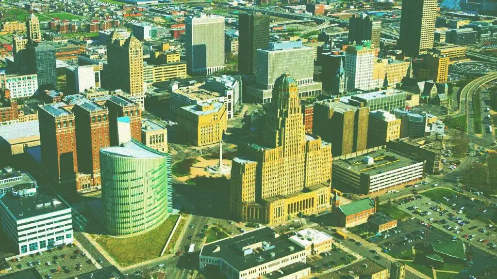 a picture of downtown buffalo ny edited with a green filter laid overtop of it. 